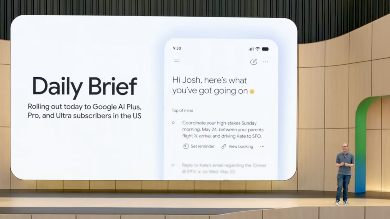 A Daily Brief slide on a stage with a presenter